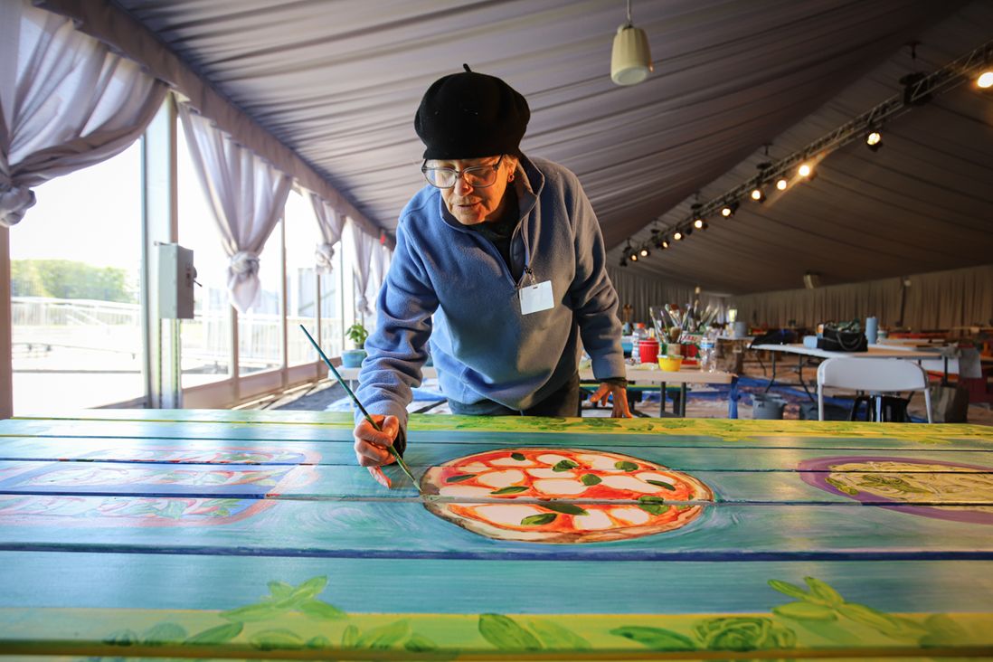 Wooden tables decorated by artists